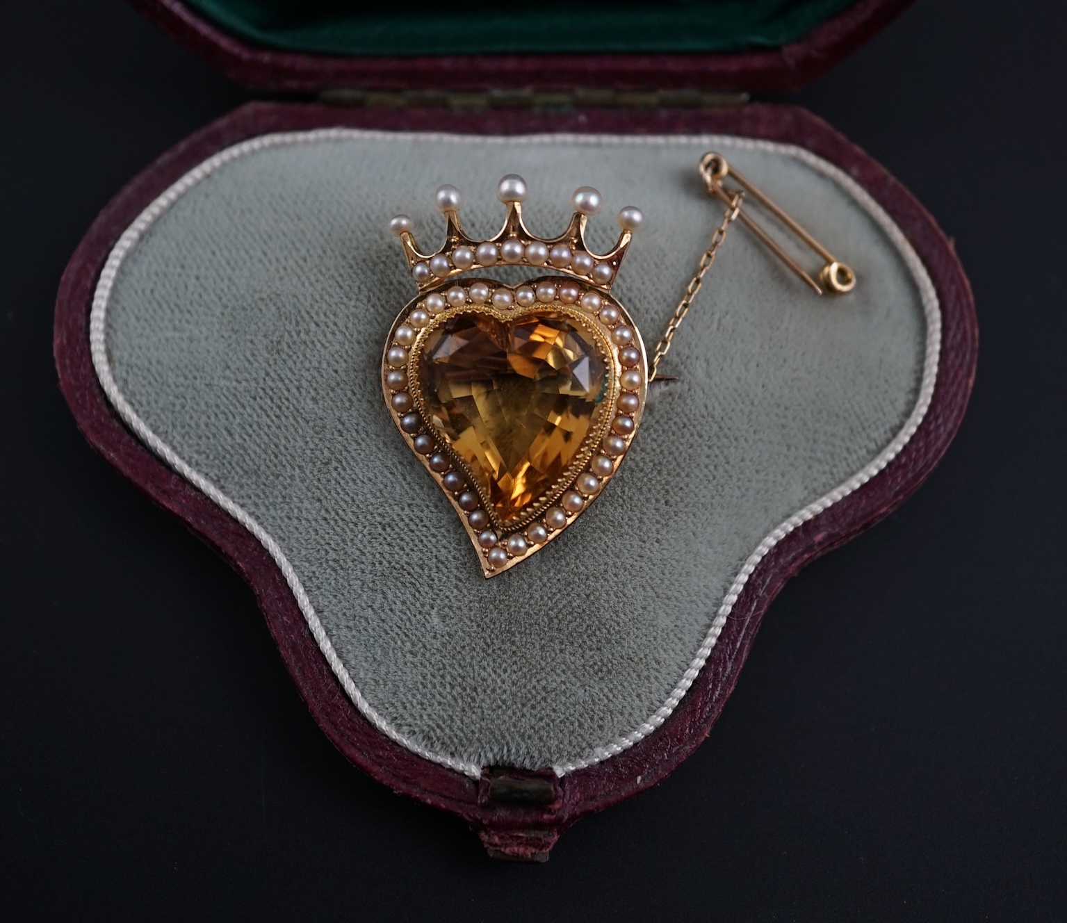 A Victorian gold, single stone heart shaped citrine and seed pearl cluster set coronet brooch